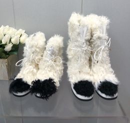 Stivali da neve caldi in pelliccia bianca di alta qualità marca designer di lusso da donna scarpe stivali da neve a mezzogiorno