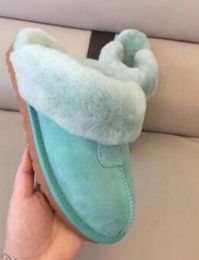 UG Gsity Hot sell Unisex Classic design 51250 Warm slippers goat snow boots Martin short women keep warm shoes 568