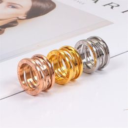Top Quality Stainless Steel Hollow out Spring ring Women Designer Roman numerals Rose Colours Lover engagement Fashion Couple Jewel2843