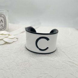 2023 Luxury quality charm opened bangle with words design in white black blue Colour design have box stamp PS7361B2665