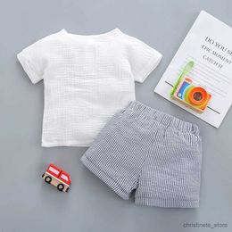 Clothing Sets 2PCS Baby boy summer bubble cotton pure Colour round collar short sleeve button pullover + belt stripe shorts suit R231215