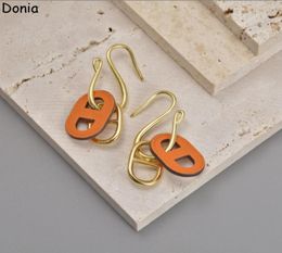 Donia Jewellery luxury stud European and American fashion pig nose titanium steel fourcolor creative leather designer earrings gift6267456