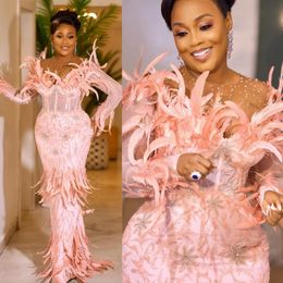 Luxurious Light Pink Aso Ebi Prom Dresses Feather Mermaid Illusion Sheer Neck Long Sleeves Lace Evening Formal Dress Birthday Party Gowns Second Reception NL015