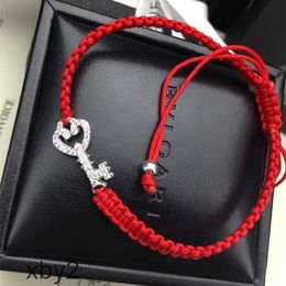 Charm Bracelets Benmingnian Red Rope T Family Pure Silver Key Weaving Bracelet with Micro Diamond Embedding Exquisite 2024 DESIGNERS