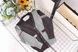 Luxury baby Knitted Jacket Long sleeved V-neck designer kids cardigan Size 100-150 Multi color splicing design girl boy sweater Dec05