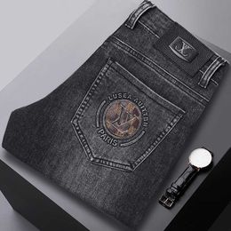 Jeans firmati di lusso da uomo Hong Kong jeans di marca alla moda di fascia alta stampati autunno nuova tendenza uomo slim fit pantaloni a gamba piccola da uomo lunghi