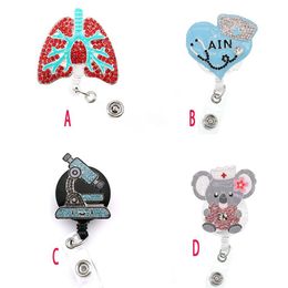 10pcs lot Key Rings Doctor Nurse Retractable Rhinestone Crystal Enamel Medical Pink Lung AIN Bear ID Badge Reel Holder Clip199g