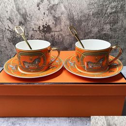 Mugs Luxury Tea Cups And Saucers Set Of 2 Fine Bone China Coffee Golden Handle Royal Porcelain Party Espresso 230731 Drop Delivery Hom Dh2Rc