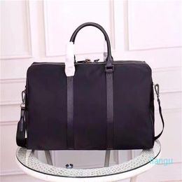 Ganz neue Leinwand Duffel -Taschen für Männer Top -Qualität klassischer Reisegepäcktasche für Mann Totes Leder Handtasche Fashion Duffle Bag229g