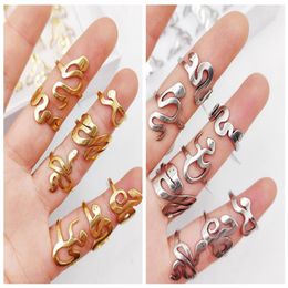 Whole 30pcs Stainless steel Silver Gold Styles Mix Snake Ring Male Female Women Rings Exaggerated Jewelry251l