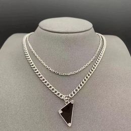 Womens Mens Luxury Designer Necklace Wedding Party Gifts Black White Triangle Pendant Double Chain Letter Stainless Steel Jewellery 2556
