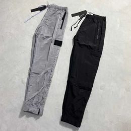 Brand Designers Pants Stone Metal Nylon Pocket Embroidered Badge fashion Casual Trousers Thin Reflective island Tidal Flow Design 688ss 2023