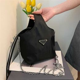 2024 New Designer women's crossbody shoulder simple vegetable basket damp nylon cloth hand drawstring bucket leisure chain diagonal bag