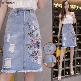 Dresses Oversize Denim Skirt for Women High Waist 3d Flower Beading Appliques Embroidery Tassel Ripped Hole Jeans Skirt Streetwear