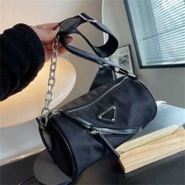 2024 New Designer women's crossbody shoulder Simple leisure pillow are popular this chain Personalised nylon cloth messenger cylinder bag