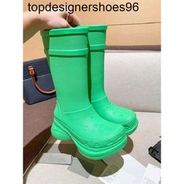 New 24ss luxury long tube rubber boots designer womens thick soles round head slip thick soles fashion brand versatile high tube rain womens boots