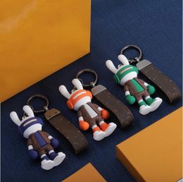 Very cute True leather Car keychain Luxury designer Jewellery keychains Fashion pendant Brand Key ring for charm men women with Original gift box