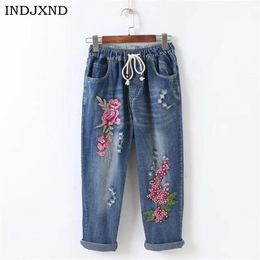 Jeans Women Pants Lápis Esticará jeans de bordado magro de cintura alta sem ripshed woman orifícios florais calças calças calças de calça jeans