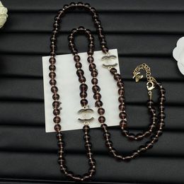 New Double-letter Enamel Necklace Retro High Version Black Transparent Pearl Sweater Chain Small Fragrant Wind Long Money Decoration