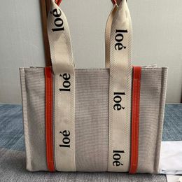 Famous Designer Canvas Classic Color Block Letter Tote Bag Women's Commuter Travel Fashion Popular Waterproof Canvas Fabric One Shoulder Travel Handbag 37CM/29CM