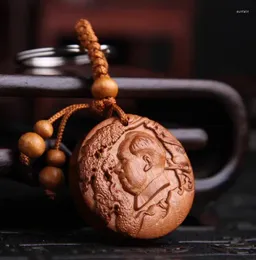 Decorative Figurines Chinese Peach Wood Carved Safe And Auspicious Word Chiairman Head Statue Exquisite Car Key Chain Pendant