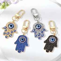 Keychains Lanyards Shiny Hollow Evil Eye Hamsa Hand Keychain Female Keyring Zircon Fatima Hand Blue Eye Bag Car Airpods Box Key Accessories Q240521