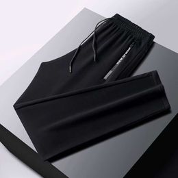 Calças esportivas casuais masculinas 2024 primavera e outono ajuste solto perna reta versátil inverno pelúcia estilo chinês calças sanitárias calças de trabalho