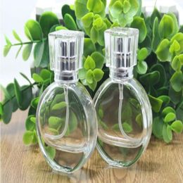 Wholesale Amazing Glass Refillable Bottles 25ml Empty Perfume Pump Bottles with Silver Sprayer and Clear Cap Hqist