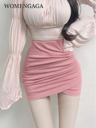 Dresses WOMENGAGA Pink Peach Half Skirt Cross Pleated Hem Tight Thin Hip Wrap Skirt Korean 2022 New Elastic Hot Sex Sweet Women SCL7