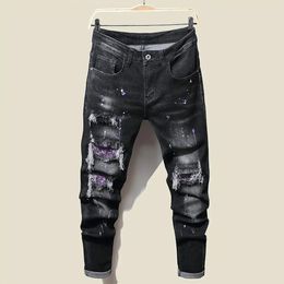 New men's ultra-thin jeans with torn tassel holes and elastic paint spray black stitched beggar pants men's designer jeans 231222