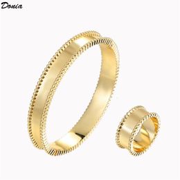 Donia jewelry luxury bangle party European and American fashion four-leaf clover glossy titanium steel designer bracelet ring set 326P