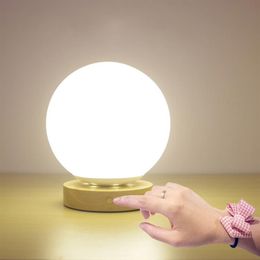 Creative bedroom bedside lamp remote control dimming eye protection nursing night lamp solid wood decoration rechargeable table la3109