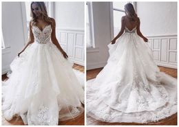 Sexy A Line Dresses Spaghetti Straps Illusion Sleeveless Lace Appliques Ruffles Tiered Bridal Gowns Wedding Dress Open Back 403