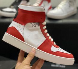 The new classic brand high-top canvas shoes are luxury and comfortable with retro skull patterns Fashion lovers men's casual sneakers out shoes