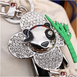 Keychains & Lanyards Luxury Designer Keychain Stylish Sun-Flower Doll Pendant Keychains Panda Keys Buckle Mens Womens Bag Key Ornamen Dh1Eo