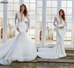 Arabic Aso Ebi Tulle Overskirts Trumpet Wedding Dresses Plunging V Neck Sexy Bridal Gowns Bohemian Lace Flare Long Sleeves Mermaid Vestidos De Novia Plus Size CL3101