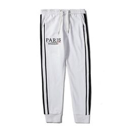 Mens Luxury Jogger Pants Branded Drawstring Sports Pants High Fashion Black White Colours Side Stripe Designer Joggers6688567