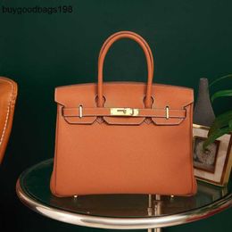 Designers Handbags Bags High Order Togo Li Grain Head Layer Leather Semi Manual Bag 25 30cm Handbag Womens Large Capacity