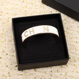 Excellent quality Charm opened Bangle Bracelet middle wide with black and white enamel design words color have box stamp PS3323212u