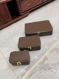Classic fashion storage box Makeup bag box Jewelry box It comes in 3 colors: presbyopia, black flower, black check can store your cosmetics jewelry designer bag