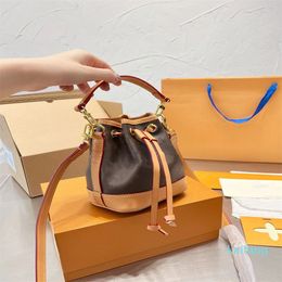 Women bag Designer Fashion 1V Mini size colorchanging leather drawstring bucket bag
