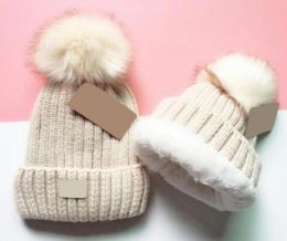 Whole High quality Winter caps Hats Women and men Beanies with Real Raccoon Fur Pompoms Warm Girl Cap snapback pompon beanie 65736041