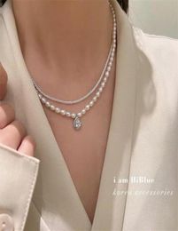 Korean Version of The New Freshwater Pearl Necklace Retro Multilayer Temperament Clavicle Chain Platinum Plated Zircon Pendant Cr9615090