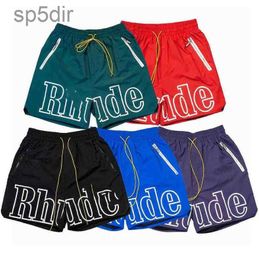 2023 New Designer Shorts Rhude Summer Fashion Beach Pants Men Women High Quality Street Wear Red Blue Black Purple Mens Short Us Size S-2xl 0Z53