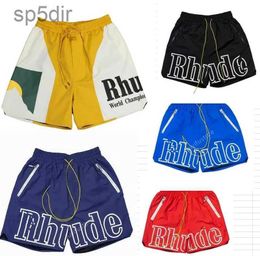 Designer Rhude Men's Shorts Summer Fashion Beach Pants Men High Quality Street Wear Red Blue Black Purple Mens Loose Short Size S-xl B3N7