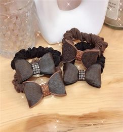 Classic s Printed Head Ropes Leather Hair Rings Diamond Bow Hair Rubber Bands Designer Rhinestone Hair Rings Whole4906889
