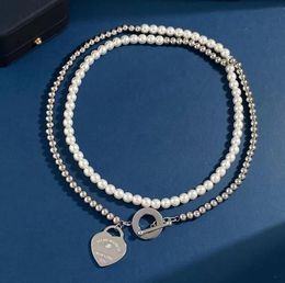 Bracelets Luxury Letter Love Heart Necklace Bracelet Stainless Steel Design OT Button Necklace Double Pearl Steel Bead Diamond Heart Clavicl