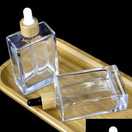 10Pc 100Ml Flat Square Glass Dropper Bottle Transparent With Bamboo Cap Golden Rose Gold Black Y220428 Drop Delivery Dhxdh
