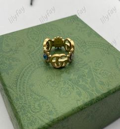 Designer Ring Golden Flower Pattern Love Luxury Rings Blue Diamond Fashion Womens Jewellery Men Shining Never Fade Not Allergic Size2003451