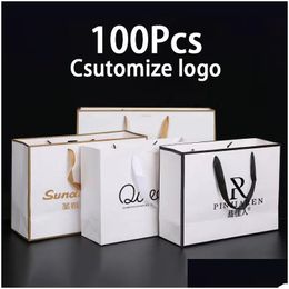 Packing Paper Wholesale Packaging 100Pcs Custom Gift Bag Personalization Business Shop Clothes Package Kraft Bags Party Wedding Supp Dhkmi